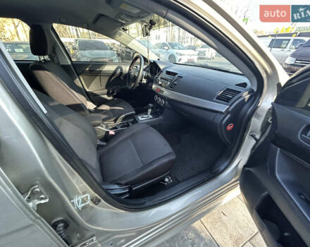 Бежевий Міцубісі Lancer, об'ємом двигуна 2 л та пробігом 250 тис. км за 8400 $, фото 27 на Automoto.ua