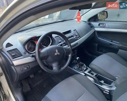 Бежевый Мицубиси Лансер, объемом двигателя 1.5 л и пробегом 242 тыс. км за 5999 $, фото 17 на Automoto.ua