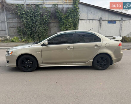 Бежевый Мицубиси Лансер, объемом двигателя 2 л и пробегом 238 тыс. км за 5500 $, фото 3 на Automoto.ua