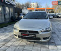 Бежевий Міцубісі Lancer, об'ємом двигуна 2 л та пробігом 250 тис. км за 8400 $, фото 5 на Automoto.ua