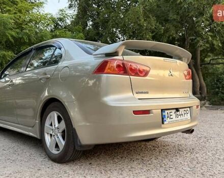 Бежевий Міцубісі Lancer, об'ємом двигуна 2 л та пробігом 132 тис. км за 7500 $, фото 6 на Automoto.ua