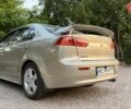 Бежевий Міцубісі Lancer, об'ємом двигуна 2 л та пробігом 132 тис. км за 7500 $, фото 6 на Automoto.ua