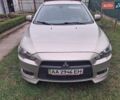 Бежевий Міцубісі Lancer, об'ємом двигуна 2 л та пробігом 160 тис. км за 7500 $, фото 1 на Automoto.ua
