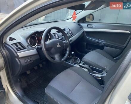 Бежевый Мицубиси Лансер, объемом двигателя 1.5 л и пробегом 242 тыс. км за 5999 $, фото 23 на Automoto.ua