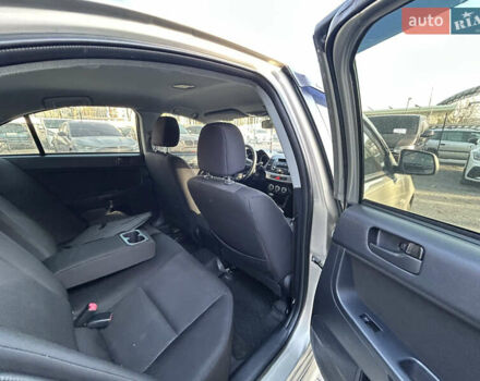 Бежевий Міцубісі Lancer, об'ємом двигуна 2 л та пробігом 250 тис. км за 8400 $, фото 25 на Automoto.ua