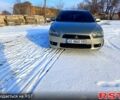 Бежевий Міцубісі Lancer, об'ємом двигуна 2 л та пробігом 230 тис. км за 6700 $, фото 1 на Automoto.ua