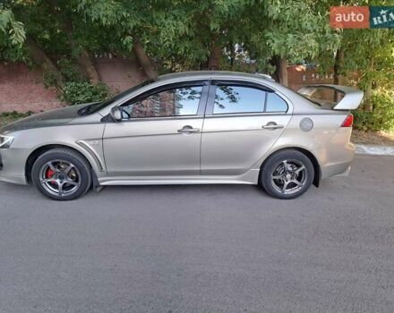 Бежевый Мицубиси Лансер, объемом двигателя 2 л и пробегом 142 тыс. км за 6300 $, фото 8 на Automoto.ua