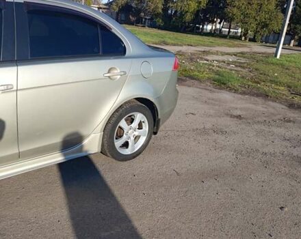 Міцубісі Lancer 2007 у Христиновке на Automoto.ua Бежевий Міцубісі Lancer, об'ємом двигуна 2 л та пробігом 141 тис. км за 6500 $, фото 13 на Automoto.ua
