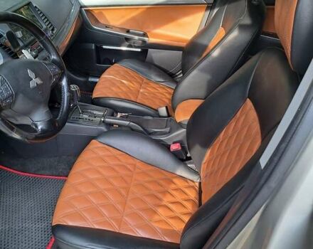 Бежевый Мицубиси Лансер, объемом двигателя 2 л и пробегом 142 тыс. км за 6300 $, фото 4 на Automoto.ua