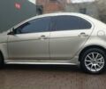 Бежевий Міцубісі Lancer, об'ємом двигуна 2 л та пробігом 200 тис. км за 6500 $, фото 5 на Automoto.ua
