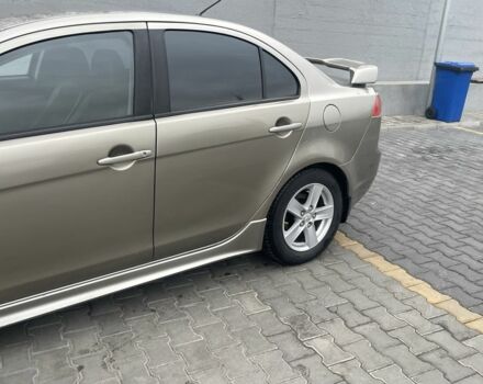 Бежевый Мицубиси Лансер, объемом двигателя 2 л и пробегом 230 тыс. км за 5799 $, фото 1 на Automoto.ua