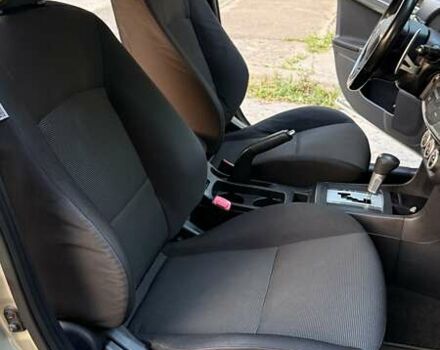Бежевий Міцубісі Lancer, об'ємом двигуна 2 л та пробігом 132 тис. км за 7500 $, фото 16 на Automoto.ua