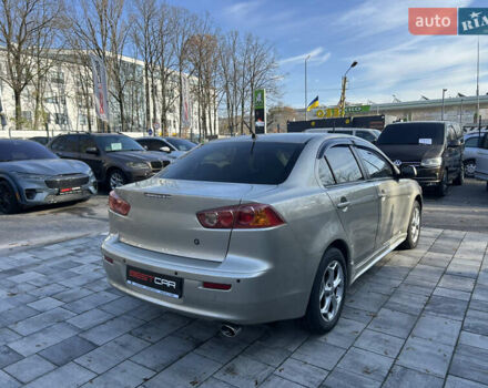 Бежевий Міцубісі Lancer, об'ємом двигуна 2 л та пробігом 250 тис. км за 8400 $, фото 8 на Automoto.ua