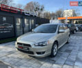 Бежевий Міцубісі Lancer, об'ємом двигуна 2 л та пробігом 250 тис. км за 8400 $, фото 2 на Automoto.ua