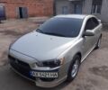 Бежевий Міцубісі Lancer, об'ємом двигуна 0.15 л та пробігом 190 тис. км за 5700 $, фото 1 на Automoto.ua