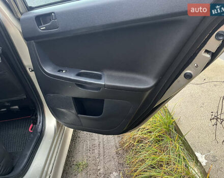 Бежевый Мицубиси Лансер, объемом двигателя 2 л и пробегом 278 тыс. км за 3100 $, фото 32 на Automoto.ua