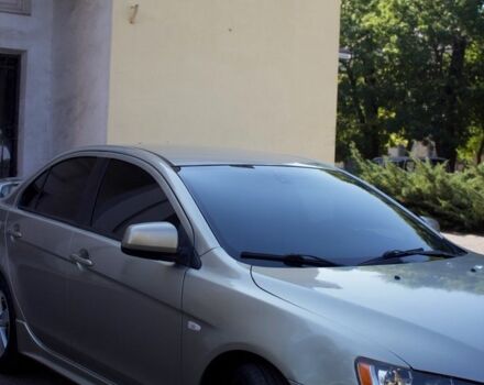 Бежевий Міцубісі Lancer, об'ємом двигуна 2 л та пробігом 220 тис. км за 7900 $, фото 3 на Automoto.ua