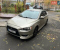 Бежевий Міцубісі Lancer, об'ємом двигуна 2 л та пробігом 240 тис. км за 6300 $, фото 1 на Automoto.ua