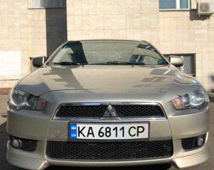 Бежевий Міцубісі Lancer, об'ємом двигуна 2 л та пробігом 221 тис. км за 6700 $, фото 3 на Automoto.ua