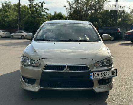 Бежевий Міцубісі Lancer, об'ємом двигуна 2 л та пробігом 205 тис. км за 5500 $, фото 1 на Automoto.ua