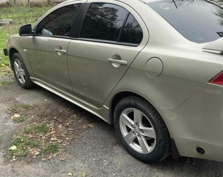 Бежевий Міцубісі Lancer, об'ємом двигуна 2 л та пробігом 290 тис. км за 6000 $, фото 2 на Automoto.ua