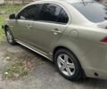 Бежевий Міцубісі Lancer, об'ємом двигуна 2 л та пробігом 290 тис. км за 6000 $, фото 2 на Automoto.ua