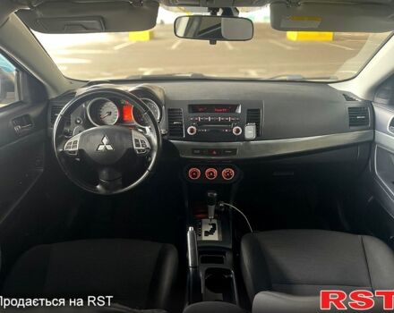 Бежевый Мицубиси Лансер, объемом двигателя 2 л и пробегом 190 тыс. км за 6350 $, фото 6 на Automoto.ua