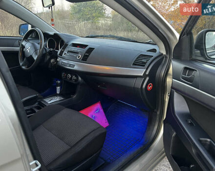Бежевий Міцубісі Lancer, об'ємом двигуна 1.5 л та пробігом 206 тис. км за 5989 $, фото 7 на Automoto.ua
