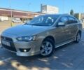 Бежевий Міцубісі Lancer, об'ємом двигуна 2 л та пробігом 176 тис. км за 5110 $, фото 1 на Automoto.ua