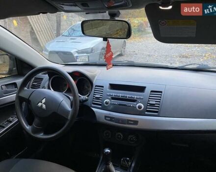 Бежевый Мицубиси Лансер, объемом двигателя 1.5 л и пробегом 242 тыс. км за 5999 $, фото 26 на Automoto.ua