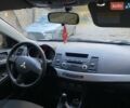 Бежевый Мицубиси Лансер, объемом двигателя 1.5 л и пробегом 242 тыс. км за 5999 $, фото 26 на Automoto.ua