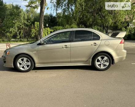 Бежевий Міцубісі Lancer, об'ємом двигуна 2 л та пробігом 205 тис. км за 5500 $, фото 6 на Automoto.ua