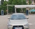 Бежевий Міцубісі Lancer, об'ємом двигуна 1.5 л та пробігом 185 тис. км за 6550 $, фото 28 на Automoto.ua