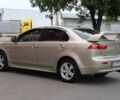 Бежевий Міцубісі Lancer, об'ємом двигуна 2 л та пробігом 274 тис. км за 6500 $, фото 3 на Automoto.ua