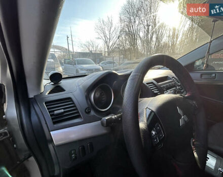 Бежевий Міцубісі Lancer, об'ємом двигуна 2 л та пробігом 250 тис. км за 8400 $, фото 19 на Automoto.ua