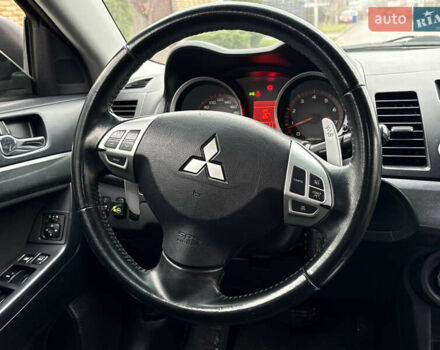 Бежевый Мицубиси Лансер, объемом двигателя 2 л и пробегом 250 тыс. км за 6400 $, фото 11 на Automoto.ua