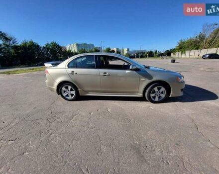 Бежевий Міцубісі Lancer, об'ємом двигуна 2 л та пробігом 180 тис. км за 6500 $, фото 7 на Automoto.ua