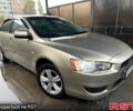 Бежевий Міцубісі Lancer, об'ємом двигуна 1.5 л та пробігом 210 тис. км за 5750 $, фото 1 на Automoto.ua