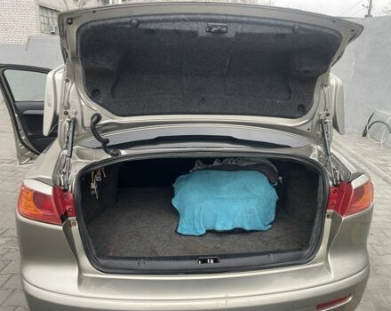 Бежевый Мицубиси Лансер, объемом двигателя 2 л и пробегом 230 тыс. км за 5799 $, фото 7 на Automoto.ua