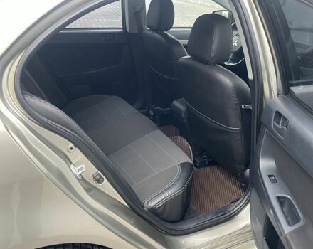 Бежевый Мицубиси Лансер, объемом двигателя 2 л и пробегом 230 тыс. км за 5799 $, фото 2 на Automoto.ua