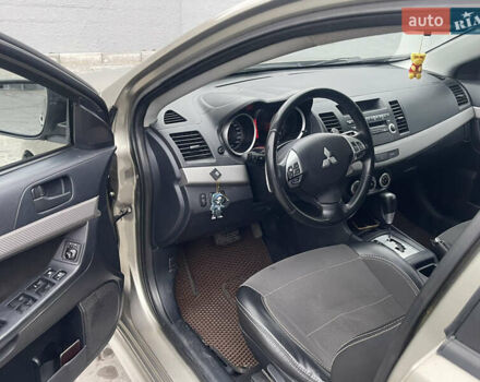 Бежевый Мицубиси Лансер, объемом двигателя 2 л и пробегом 230 тыс. км за 5599 $, фото 10 на Automoto.ua