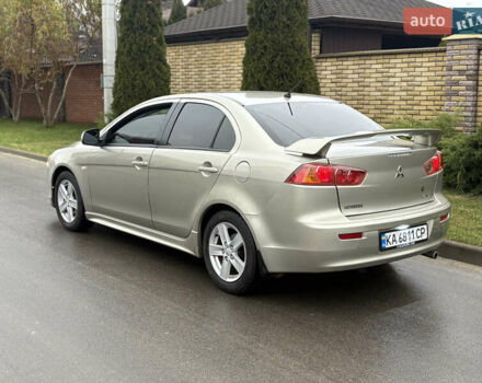 Бежевый Мицубиси Лансер, объемом двигателя 2 л и пробегом 250 тыс. км за 6400 $, фото 2 на Automoto.ua