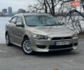Бежевий Міцубісі Lancer, об'ємом двигуна 2 л та пробігом 268 тис. км за 5600 $, фото 1 на Automoto.ua