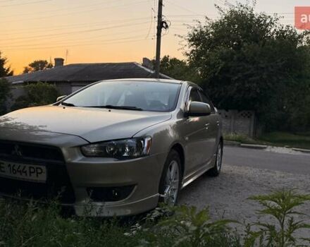 Бежевий Міцубісі Lancer, об'ємом двигуна 2 л та пробігом 132 тис. км за 7500 $, фото 1 на Automoto.ua