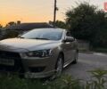 Бежевий Міцубісі Lancer, об'ємом двигуна 2 л та пробігом 132 тис. км за 7500 $, фото 1 на Automoto.ua