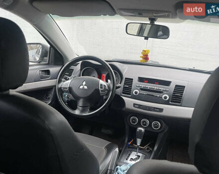 Бежевый Мицубиси Лансер, объемом двигателя 2 л и пробегом 230 тыс. км за 5599 $, фото 6 на Automoto.ua