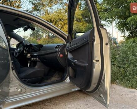 Бежевий Міцубісі Lancer, об'ємом двигуна 2 л та пробігом 132 тис. км за 7500 $, фото 10 на Automoto.ua