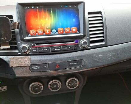 Бежевый Мицубиси Лансер, объемом двигателя 2 л и пробегом 142 тыс. км за 6300 $, фото 13 на Automoto.ua