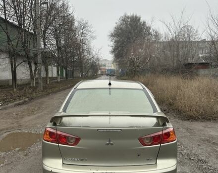 Бежевый Мицубиси Лансер, объемом двигателя 2 л и пробегом 270 тыс. км за 4950 $, фото 3 на Automoto.ua
