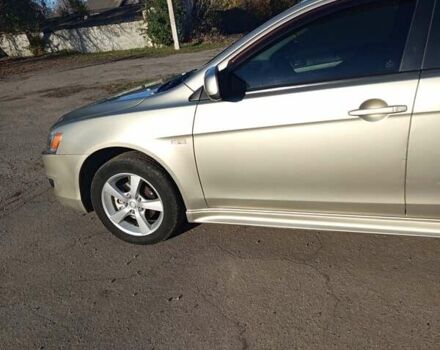 Міцубісі Lancer 2007 у Христиновке на Automoto.ua Бежевий Міцубісі Lancer, об'ємом двигуна 2 л та пробігом 141 тис. км за 6500 $, фото 24 на Automoto.ua